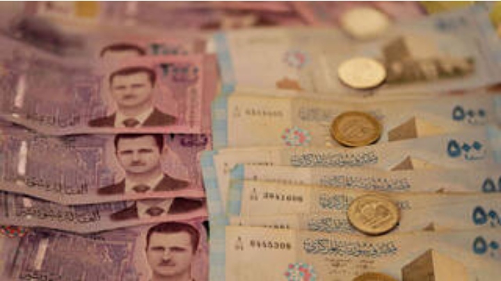 بنك سوريا المركزي يضع سعر صرف جديدا للدولار في التعاملات الرسمية