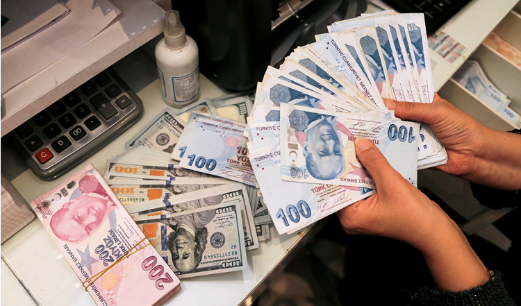 الليرة التركية تقترب من مستوى متدن قياسي عند 20 مقابل الدولار